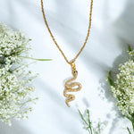 Golden Snake charm pendant for your EXπ₯²ππ₯
